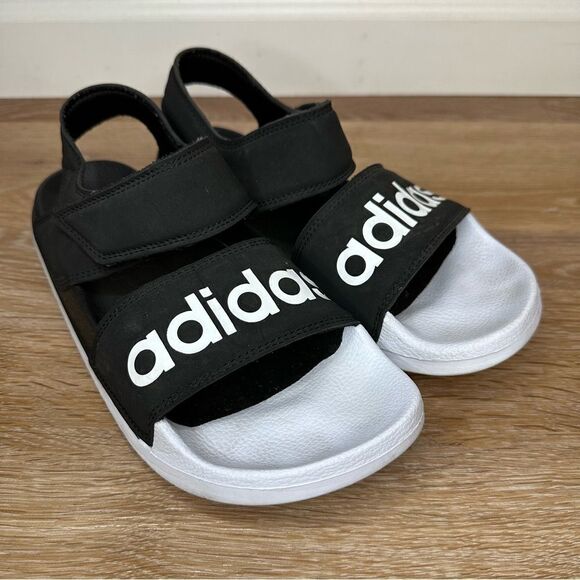 Adidas Unisex Adilette Black White Sandals - Picture 1 of 13